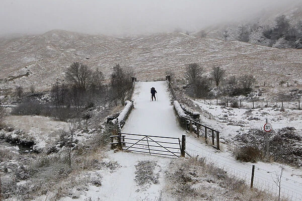 Hillwalker Dougie Andrews walks through the snow on the West Highland Way near Tynedrum