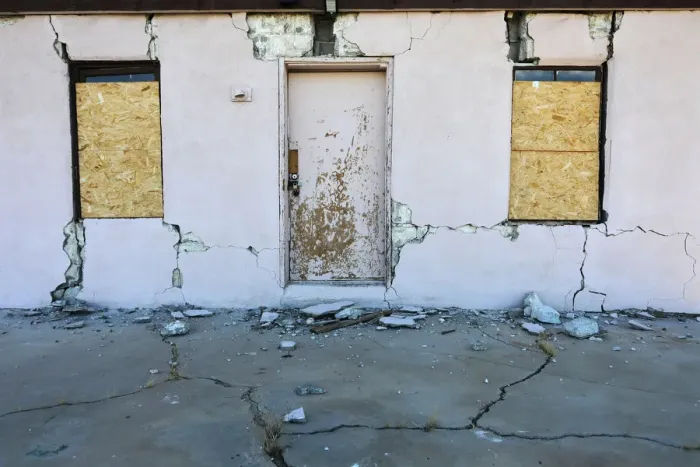 Framed Print : A house is seen damaged from a powerful earthquake that struck Southern California Framed Print : A house is seen damaged from a powerful earthquake that struck Southern California