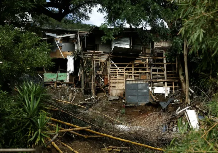 Framed Print : Houses damaged by a mudslide is seen after that the Storm Nate affected the country in
