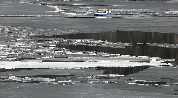 A hovercraft sails along the Yenisei River outside Krasnoyarsk