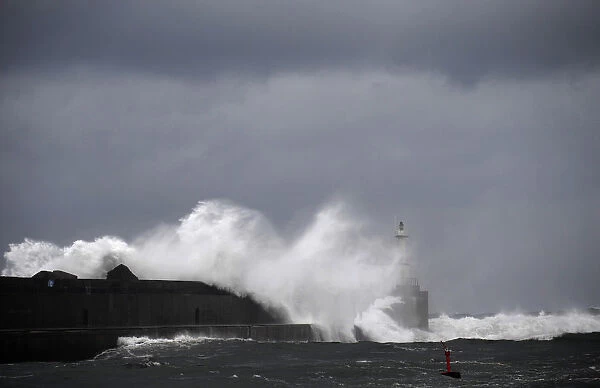 Huge waves crash onto San Esteban de Pravia seafront in the northern Spanish region