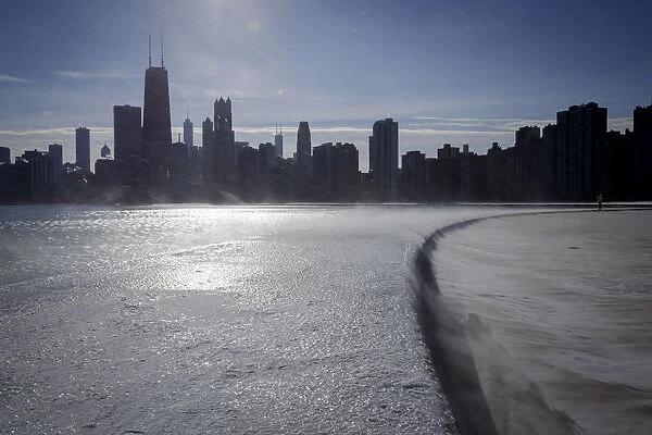 Ice covers the shore of Lake Michigan in Chicago where temperatures have dropped well