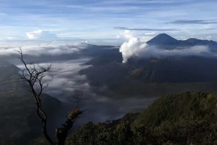 Framed Print : Indonesias Mount Bromo volcano spew smoke next to Mount Semeru volcano as seen Framed Print : Indonesias Mount Bromo volcano spew smoke next to Mount Semeru volcano as seen