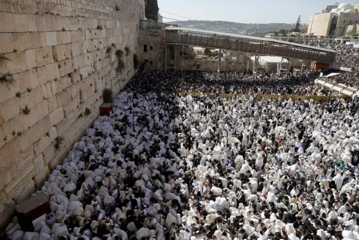 Framed Print : Jewish worshippers are seen from above during the priestly blessing prayer on the holiday