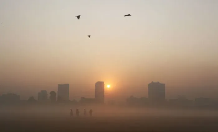 Framed Print : Joggers stand amid dense fog on a cold winter morning in Kolkata Framed Print : Joggers stand amid dense fog on a cold winter morning in Kolkata