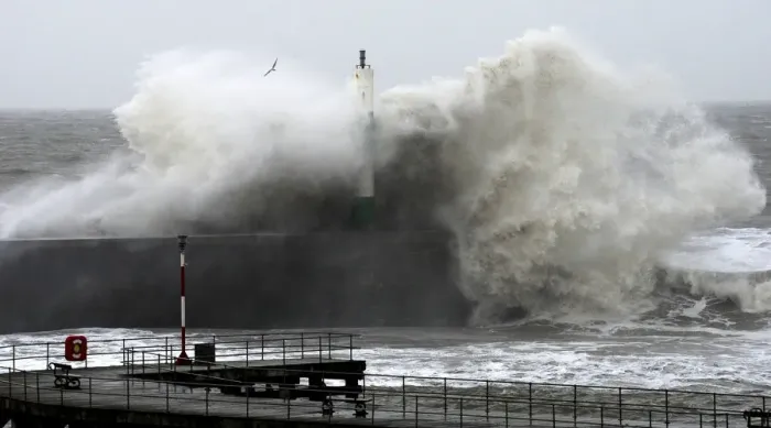 Framed Print : Large waves crash over the jetty at Aberystwyth in mid Wales Framed Print : Large waves crash over the jetty at Aberystwyth in mid Wales
