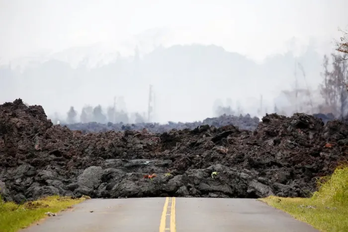 Framed Print : A lava flow covers a road in the Leilani Estates subdivision during ongoing eruptions of Framed Print : A lava flow covers a road in the Leilani Estates subdivision during ongoing eruptions of