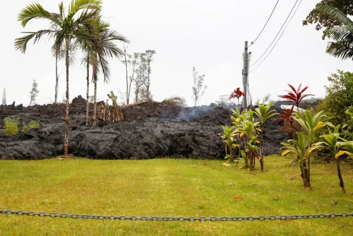 Framed Print : Lava partially covers a yard in the Leilani Estates subdivision during ongoing eruptions Framed Print : Lava partially covers a yard in the Leilani Estates subdivision during ongoing eruptions