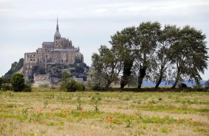 Framed Print : Le Mont Saint Michel is seen in a general view in the French western region of Normandy Framed Print : Le Mont Saint Michel is seen in a general view in the French western region of Normandy
