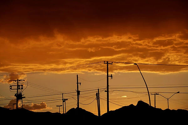 Light poles are pictured after sunset in Ciudad Juarez