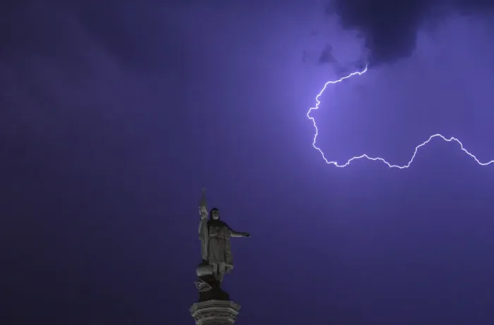 Framed Print : Lightning is seen in the sky above the Christopher Columbus monument at Madrids Colon Framed Print : Lightning is seen in the sky above the Christopher Columbus monument at Madrids Colon