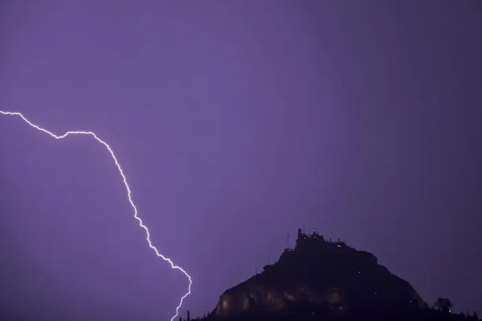 Framed Print : Lightning strikes over Lycabettus hill in Athens