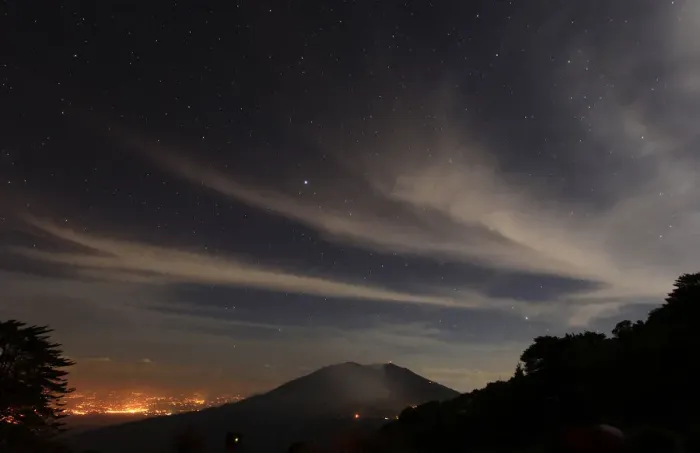 Framed Print : A long exposure photo shows stars above Turrialba volcano