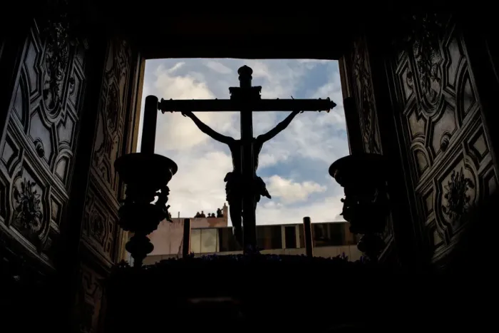 Framed Print : Los Estudiantes brotherhood wait for the start of the procession during Holy Week in Framed Print : Los Estudiantes brotherhood wait for the start of the procession during Holy Week in