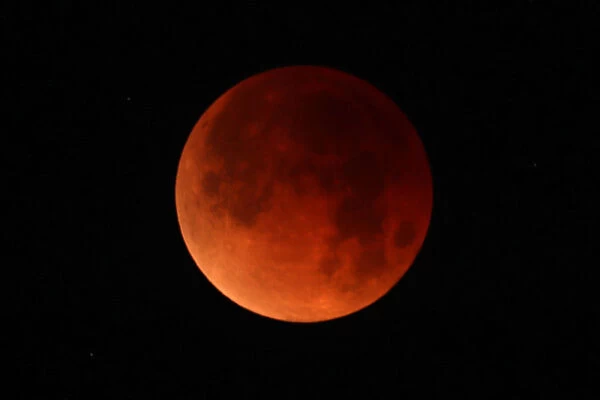 A lunar eclipse of a full Blue Moon is seen in Santa Monica