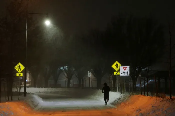 Framed Print : A man jogs on Memorial Drive during winter snow storm Grayson in Cambridge Framed Print : A man jogs on Memorial Drive during winter snow storm Grayson in Cambridge