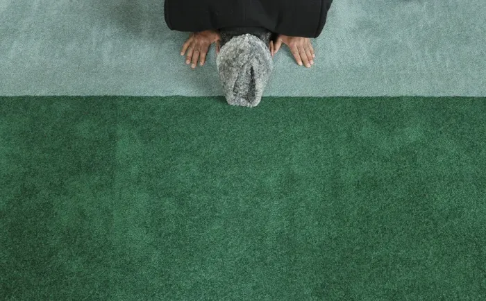 Framed Print : A man prays at the Baitul Futuh Mosque in London Framed Print : A man prays at the Baitul Futuh Mosque in London