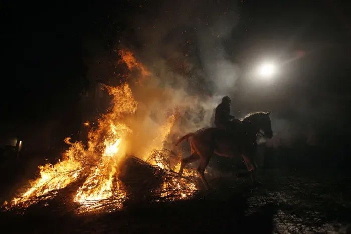 Framed Print : A man rides his horse through flames during the annual Saint Anthony purification Framed Print : A man rides his horse through flames during the annual Saint Anthony purification
