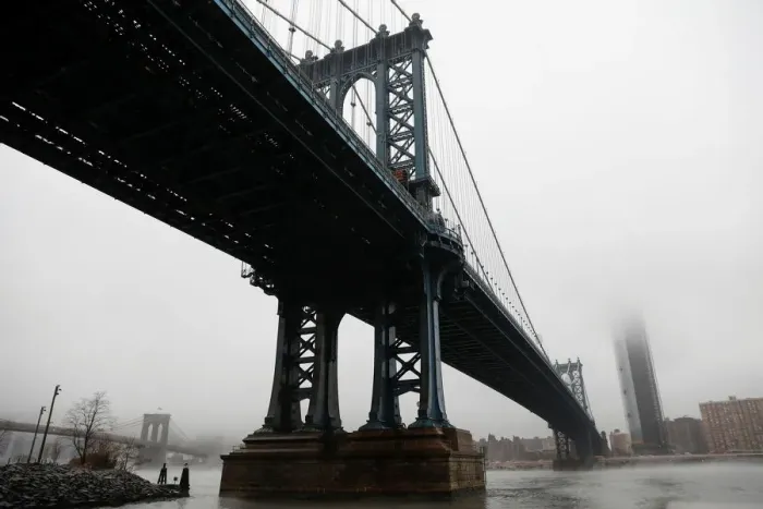Framed Print : The Manhattan skyline is seen partially in fog from beneath the Manhattan bridge in Framed Print : The Manhattan skyline is seen partially in fog from beneath the Manhattan bridge in