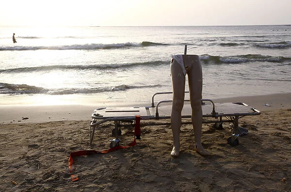 A mannequin is seen at the beach in Tripoli