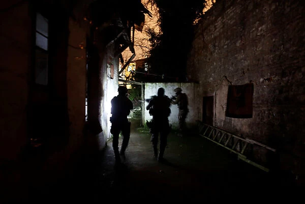 Members of Turkish police special forces take part in a drug raid in Istanbul