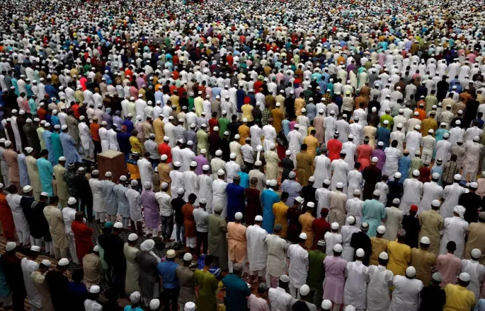 Framed Print : Men offer Eid al-Fitr prayers marking the end of the holy fasting month Ramadan at Jama