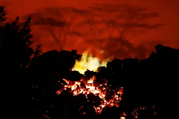 Framed Print : Methane gas burns from the lava flow that crossed Kahukai St