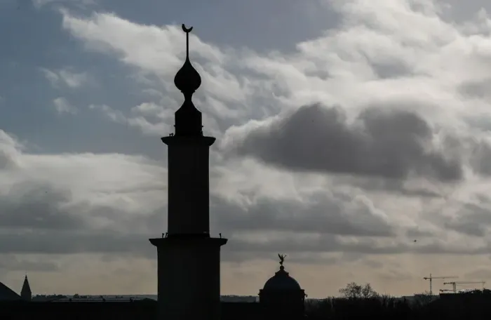 Framed Print : The minaret of the Brussels Great Mosque is seen in Brussels Framed Print : The minaret of the Brussels Great Mosque is seen in Brussels