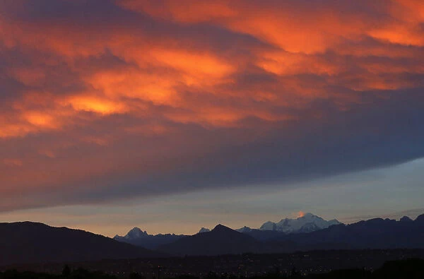 The Mont Blanc massif is pictured from Geneva at sunrise