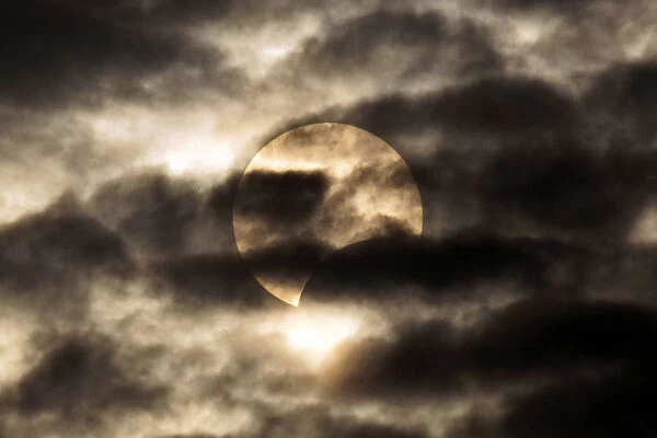 The moon passes between the sun and the earth during a solar eclipse in Shanghai