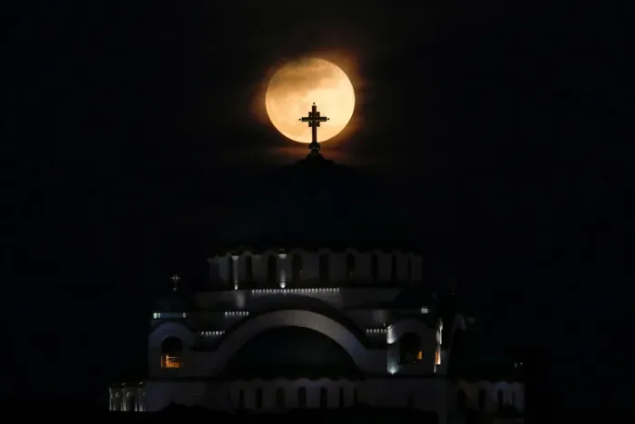 Framed Print : A full moon rises behind St. Sava temple in Belgrade Framed Print : A full moon rises behind St. Sava temple in Belgrade