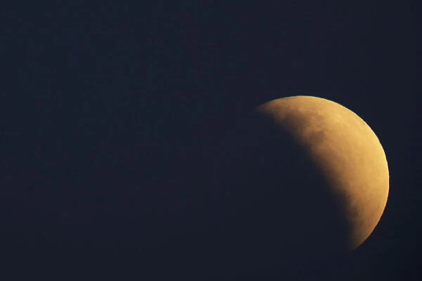 A moon is seen during a partial lunar eclipse in Brasilia