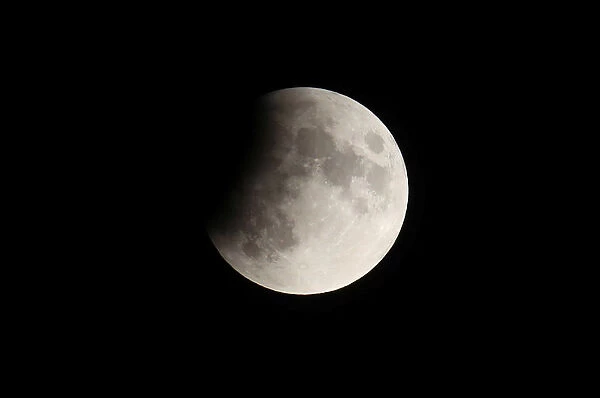 The moon is seen during a partial lunar eclipse near Urnaesch
