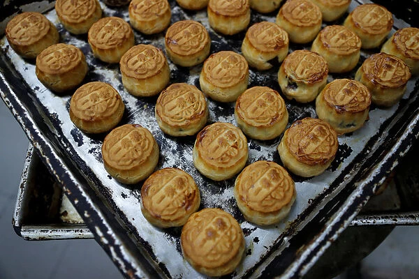 Mooncakes with Chinese words Support each other are seen at Wah Yee Tang Bakery in Hong