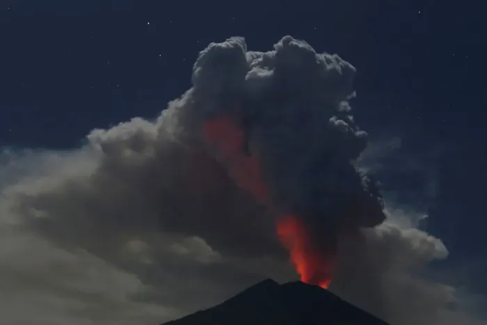 Framed Print : Mount Agung volcano erupts during the night, as seen from Datah village