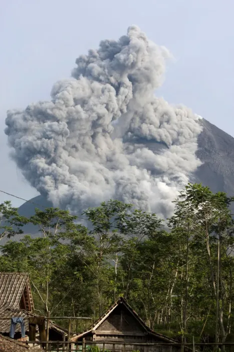 Framed Print : Mount Merapi spews pyroclastic smoke as seen from Balerante village in Klaten Framed Print : Mount Merapi spews pyroclastic smoke as seen from Balerante village in Klaten