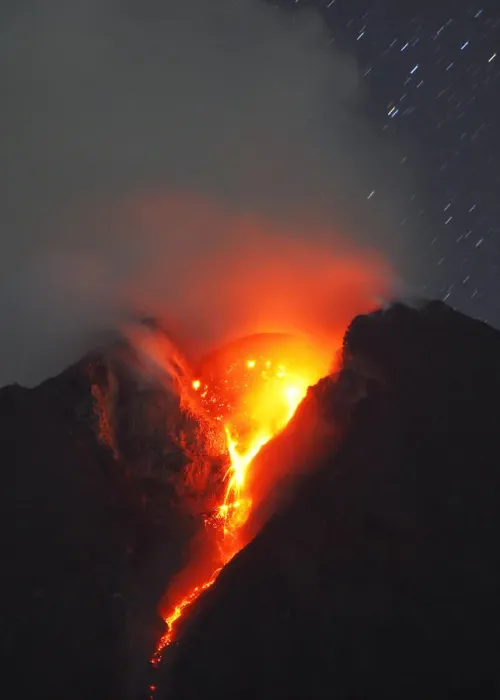 Framed Print : Mount Merapi volcano spews lava and smoke as it erupted again on Wednesday as seen Framed Print : Mount Merapi volcano spews lava and smoke as it erupted again on Wednesday as seen