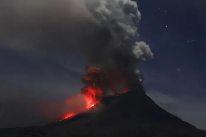 Framed Print : Mount Sinabung is seen during an eruption from Naman Teran village in Karo district Framed Print : Mount Sinabung is seen during an eruption from Naman Teran village in Karo district