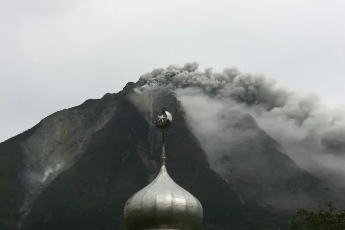 Framed Print : Mount Sinabung spews ash and hot lava as it erupts near a mosque in Karo district Framed Print : Mount Sinabung spews ash and hot lava as it erupts near a mosque in Karo district