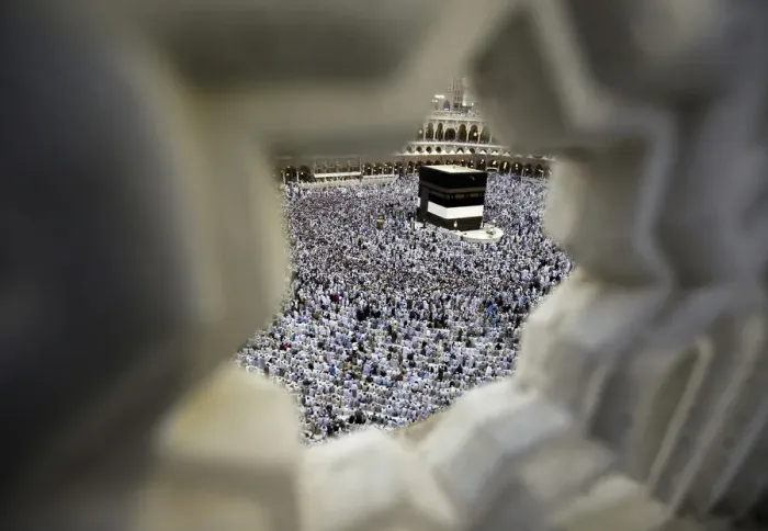 Framed Print : Muslim pilgrims circle the Kaaba and pray at the Grand mosque during the annual haj