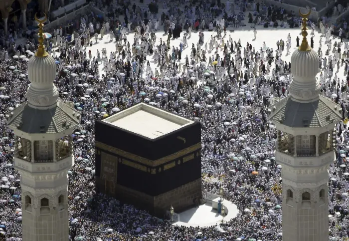 Framed Print : Muslim pilgrims circle the Kaaba and pray at the Grand Mosque on the second day of Eid Framed Print : Muslim pilgrims circle the Kaaba and pray at the Grand Mosque on the second day of Eid