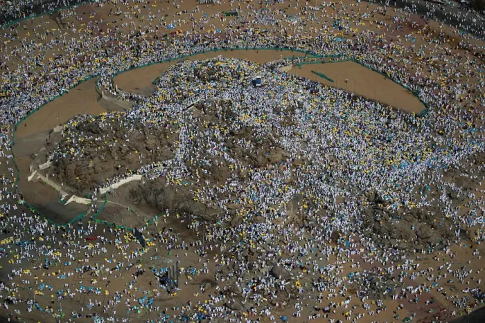 Framed Print : Muslim pilgrims gather on Mount Mercy on the plains of Arafat during the annual haj