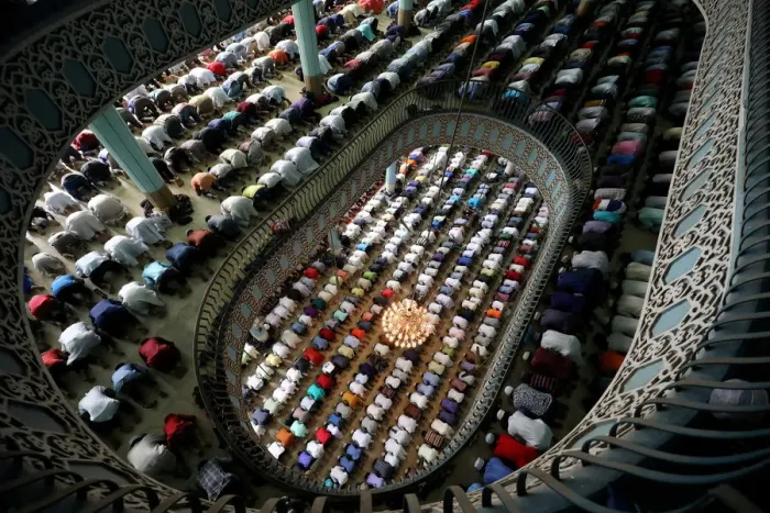 Framed Print : Muslims perform Friday prayer on the first day of Ramadan at Baitul Mukarram National
