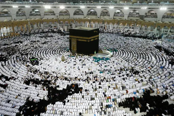 Framed Print : Muslims pray and gather around the holy Kaaba at the Grand Mosque during the holy fasting Framed Print : Muslims pray and gather around the holy Kaaba at the Grand Mosque during the holy fasting