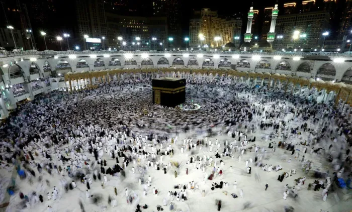 Framed Print : Muslims pray and gather around the holy Kaaba at the Grand Mosque during the holy fasting Framed Print : Muslims pray and gather around the holy Kaaba at the Grand Mosque during the holy fasting