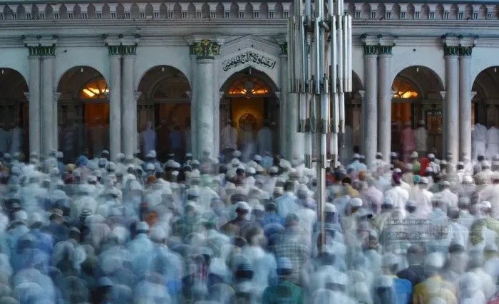 Framed Print : Nepalese Muslims attend Eid al-Fitr mass prayers at Kashmiri Takiya Jame mosque in