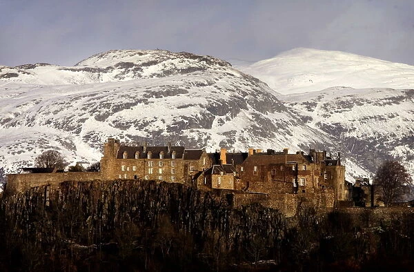 The Ochil hills are seen covered in snow behind Stirling Castle in Scotland January 18, 2005