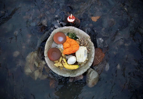 An offering offered by a devotee (not pictured) in memory of his deceased father