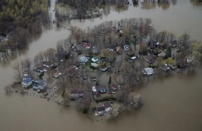 Framed Print : An overhead view showing the flooded residential neighbourhood of Ile Mercier, Quebec Framed Print : An overhead view showing the flooded residential neighbourhood of Ile Mercier, Quebec