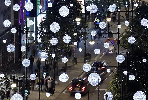 Oxford Street is illuminated after singer Cheryl Fernandez-Versini switched on the